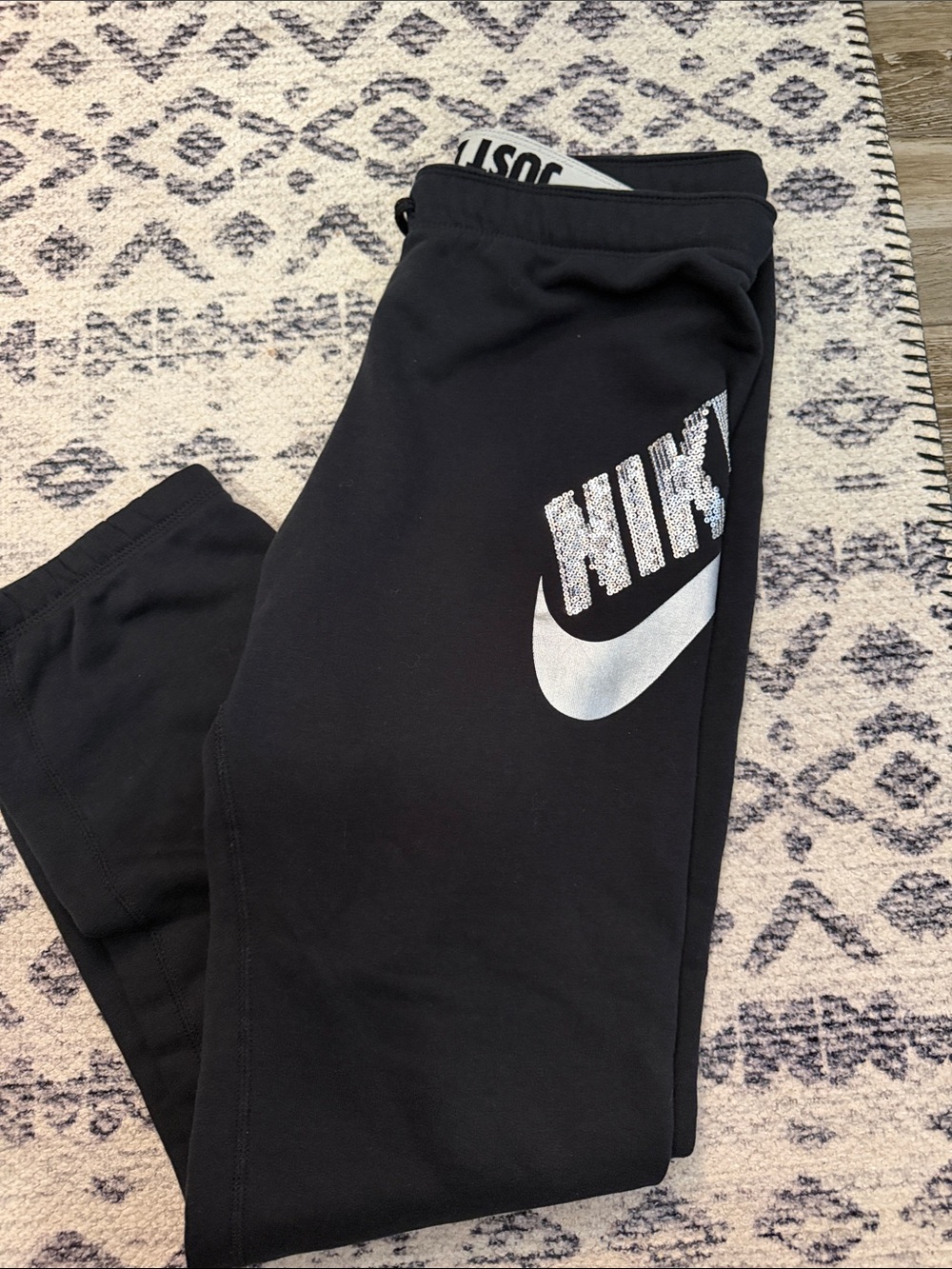 Nike Black Sweatpants with White Swoosh and Logo